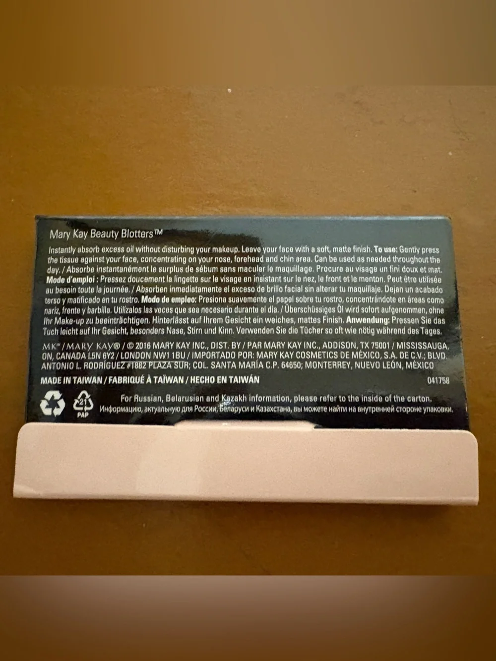 Mary Kay Oil-Absorbing Facial Tissues in Black and Beige Packaging